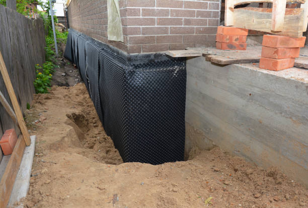 SJ Waterproofing Pros technician performing targeted Waterproofing assessment in Liberty, PA
